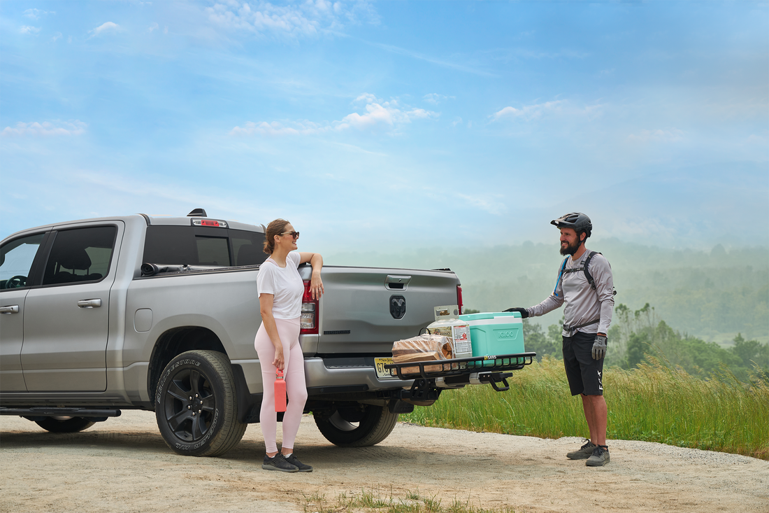 man and woman loading mhs cargo basket