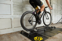 Rider warming up on Saris 9501T Cycling Rollers — pre-race indoor session