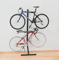 Saris Bike Bunk Horizontal Wall Storage — two bikes stored side by side on wall mount