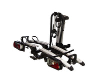 Saris Door County 2-Bike Motorized Hitch Rack — electric motor and platform tray visible
