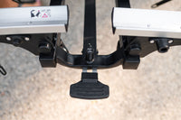 Saris Door County Rack — one-hand electric tilt handle in use