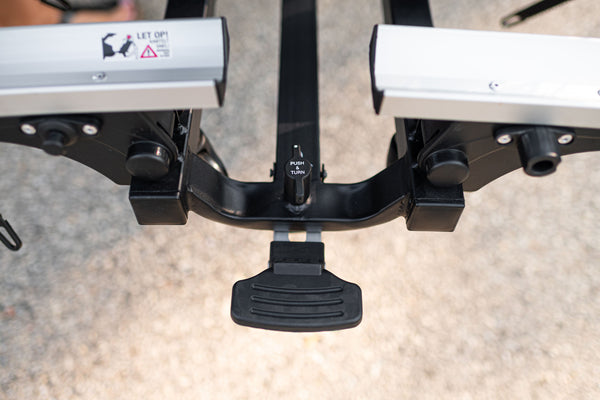 Saris Door County Rack — one-hand electric tilt handle in use