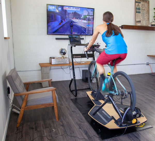Saris M2 Smart Trainer mounted on MP1 Nfinity Motion Platform — lateral rocking motion platform