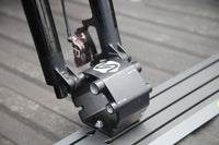 Saris Traps thru-axle fork mount — mountain bike secured in truck bed, trail access