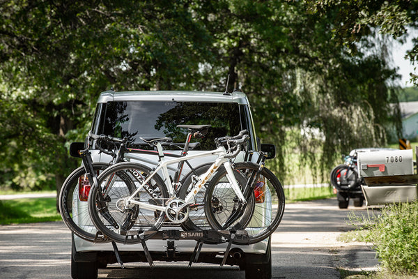 Saris SuperClamp G3 4-Bike Hitch Rack — four cradle arms fully extended