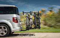 Four bikes loaded on the Saris SuperClamp G3 4-Bike Hitch Rack on an SUV